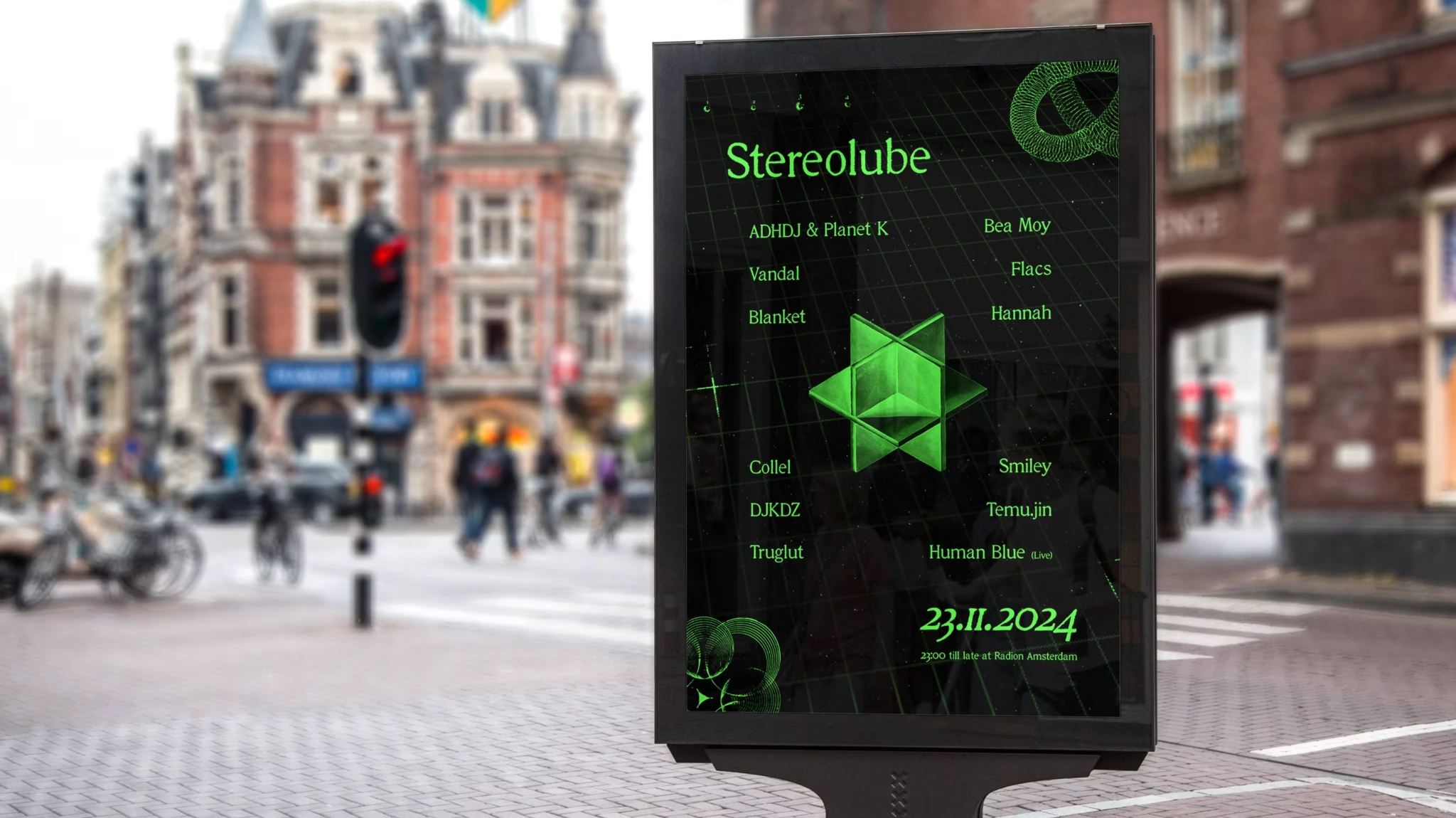 Stereolube event poster displayed in a street advertising case in Amsterdam
